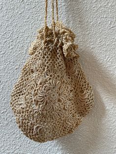 "Vintage crocheted hand bags or purses for a bride to carry at her wedding, for the bridesmaids, or as a shower gift.  Both have crocheted draw strings for closure. Use as an evening purse or costuming. A wonderful addition to a collection.  You choose which you want at check out. If you want both you will need to add them to your cart separately. The almond color one is the Irish Rose crochet style with the rose on both sides. The drawstrings are shorter so this would be a wrist length purse to Vintage Handmade Crochet Bag For Gift, Vintage Handmade Crochet Bag As Gift, Beige Crochet Evening Bag, Beige Wedding Bag For Summer, Cream Wedding Bags For Summer, Summer Wedding Beige Bag, Elegant Hand-knitted Crochet Bag For Gift, Summer Cream Crochet Bag As Gift, Elegant Hand Knitted Crochet Bag For Gift