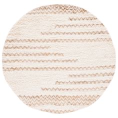 a round rug with beige and white stripes