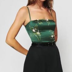 Upgrade your wardrobe with our Green Floral Chinoise Satin Camisole Top! This playful and pretty top features a beautiful Chinoise print on smooth satin fabric. Perfect for a casual day out or a night on the town, this top will add a touch of whimsy to any outfit. Try it out! Gender: WOMEN Item Type: Tops, Camisole, Tank Top Material: Polyester Satin Pattern Type: Print, Floral, Oriental Style: Prairie Chic Decoration: Shirring, Spaghetti Strap Closure Type: Pullover, Elastic Band SIZE CHART Siz Summer Corset, Satin Pattern, Prairie Chic, Satin Camisole, Satin Cami, Corset Lace, Pretty Top, Tanktop Girl, Womens Cami