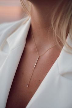 Description Pear Lariat Necklace 2.85" Length Metal DetailsMetal Type: 14KMetal Weight: 2.20 Gr Diamond DetailsCarat: 0.38 CT F-G color VS- SI clarity All chains are 18" long, with an adjuster at 16" Elegant Single Strand Long Drop Necklace, Elegant Long Drop Single Strand Necklace, Elegant Adjustable Length Jewelry For Anniversary, Elegant Lariat Drop Necklace With Single Strand, Elegant Single Strand Lariat Drop Necklace, Classic Lariat Necklace With Adjustable Chain, Timeless Lariat Necklace With Clavicle Chain For Formal Occasions, Formal Long Drop Necklace With Delicate Chain, Dainty Lariat Backdrop Necklace For Formal Occasions