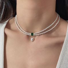 ✦ 𝐈𝐭𝐞𝐦 𝐃𝐞𝐬𝐜𝐫𝐢𝐩𝐭𝐢𝐨𝐧    Elevate your style with our exquisite Emerald Pendant Choker--a captivating blend of vintage charm and natural beauty. This stunning necklace features genuine emerald green stones and lustrous pearls, creating a timeless piece that exudes elegance. Perfect for a vintage-inspired look or a thoughtful Valentine's gift for her, this necklace effortlessly combines sophistication with a touch of romance. Adorn yourself or a loved one with this unique Natural Stone Luxury Temple Jewelry Beaded Necklace With Pearl Chain, Luxury Green Pearl Drop Necklace, Adjustable Vintage Pearl Necklace, Luxury Gold Classic Beaded Necklaces, Luxury Elegant Purple Pearl Necklace, Luxury Green Festive Choker, Pearl Gold Necklace, Emerald Green Necklace, Pearl Necklace Choker