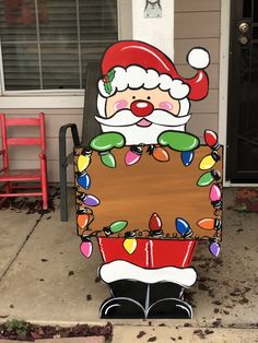 a santa clause sign on the side of a house