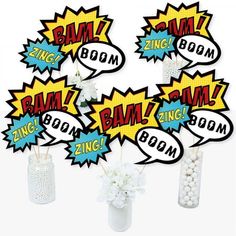 some vases filled with white flowers and comic speech bubbles on top of each other