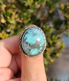 This fabulous handmade sterling silver ring was made with sterling silver, hand stamped and features a stunning Turquoise Cabochon. This is truly a statement ring. Dimensions: Length - 1 1/16 in. (26 mm) Width - 1 in. (26 mm) Size: 9 1/2 Weight: oz. - 0.52 g. - 15 Shipping and Packaging This is a 'ready to ship' item so please enjoy shipment within one day! All purchases come in a beautiful box and packaged securely and with insurance per USPS so they will arrive safely. International shipping a Spiritual Silver Jewelry With Patina, Southwestern Silver Turquoise Ring For Jewelry Making, Artisan Turquoise Ring With Chrysocolla, Oval Turquoise Sterling Silver Ring, Artisan Silver Turquoise Ring Stamped 925, Silver Southwestern Turquoise Ring Gift, Southwestern Silver Turquoise Ring Gift, Southwestern Style Silver Turquoise Ring As Gift, Silver Southwestern Style Turquoise Ring As Gift