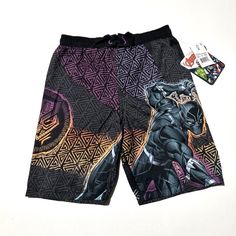 This Colorful Swimsuit Trunks Featuring Black Panther Is Perfect For Boys Who Love To Swim, Jog, Or Go To School. Made Of 100% Polyester, It Is Machine Washable And Has An Elastic Waist For A Comfortable Fit. The Animal Print Pattern And Black Color Add A Touch Of Style To The Outfit. The Brand Is Marvel And The Size Type Is Regular. This Swimsuit Is Suitable For Boys Of Size Small. It Is Not A Vintage Product And Its Country/Region Of Manufacture Is Unknown. This Item Is A Type Of Swimsuit And Casual Summer Swimwear With Character Print, Black Summer Playwear Bottoms, Black Summer Beachwear Swimwear, Casual Character Print Black Bottoms, Casual Black Bottoms With Character Print, Colorful Swimsuit, Animal Print Pattern, Animal Prints Pattern, Go To School