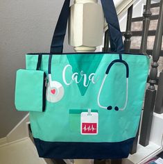 "Personalized Canvas Nurse Tote Bag  Personalized with Embroidered Name and Caduceus Symbol Available in: Navy, Green, Pink and Gray Tote Description: Top Zipper Closure Dimensions: 13½\" x 5½\" x 13½\" Material: Canvas Approximately 9\" Handle Drop Attached Coin Purse Coin Purse Dimensions: 4¼\" x 5¼\" ORDERING INFORMATION Please put the following information in the \"Notes to Seller\" at checkout: 1. Name for Personalization  2. Please let me know what color of thread you would like. 3. Please Personalized Green Bags For Daily Use, Personalized Green Travel Bag, Green Embroidered School Bag, Personalized Blue Bags For Daily Use, Green Tote Bag For Personal Use, Caduceus Symbol, Bunny Backpack, Nurse Tote Bag, Nurse Tote