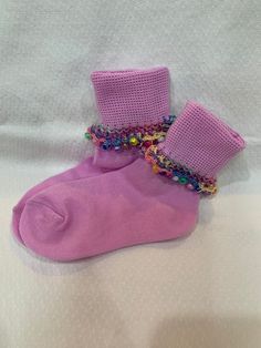 Handmade size 4-5T lavender beaded socks with pastel rainbow crochet edging and pastel multi colored pony beads All socks are handmade in a smoke free home- new, never worn  Free shipping to the United States Only ships to the United States from Denver, CO Machine wash gentle- lay flat or tumble dry low Beaded Socks, Pastel Rainbow Crochet, Socks Crochet, Slouch Socks, Toddler Socks, Rainbow Crochet, Cute Socks, Girls Socks, Pony Beads