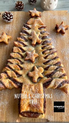 nutella christmas tree made out of cookies on a cutting board