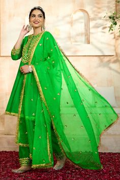 Green short anarkali with floral pattern gota embroidery. Comes with matching salwar and dupatta. - Aza Fashions Transitional Chanderi Lehenga With Gota Work, Semi-stitched Traditional Wear With Zari Work For Navratri, Green Kundan Sharara For Eid, Traditional Chanderi Palazzo Set With Gota Work, Chanderi Sets With Gota Work In Traditional Drape, Chanderi Palazzo Set With Gota Work, Traditional Drape Chanderi Palazzo Set With Gota Work, Traditional Chanderi Sets With Gota Work, Chanderi Palazzo Set With Resham Embroidery For Diwali