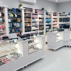 the inside of a cosmetics store with all kinds of products