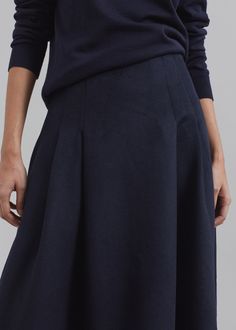 Color: Navy Heavyweight wool blend fabric Regular fit Midi length Pleated detailing Flared silhouette Concealed back zip closure Unlined 50% Wool 38% Polyester 12% Polyamide Dry Clean By The Frankie Shop. Imported Modest Long Skirts, Pleaded Skirt, The Frankie Shop, Frankie Shop, Long Skirts, Fashion Pieces, Wool Skirts, Flared Skirt, Flare Skirt