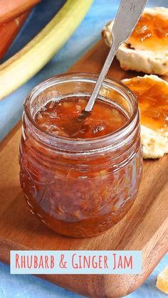 a jar of rhubarb and ginger jam on a cutting board