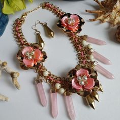 Unique Statement Necklace Set Gold Tone Chain With Gold And Pink Flowers Pearls And Crystals Acrylic Quartz And Gold Accents Matching 2" Acrylic Gold Hook Earrings Necklace Is 17" Plus 3" Extension Chain New 12 Pink Adjustable Flower Shaped Necklace, Adjustable Pink Flower-shaped Necklace, Feminine Pink Rose Quartz Jewelry, Handmade Pink Flower-shaped Necklace, Feminine Pink Flower-shaped Jewelry, Pink Flower Charm Dangle Jewelry, Pink Adjustable Flower Pendant Necklace, Pink Bohemian Necklace With Flower Charm, Bohemian Pink Necklace With Flower Charm