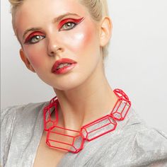 Mybf Necklace. Extremely Lightweight 3d Printed Rigid Choker Necklace. Precious Stones Like Design. Red. Description Mybf Takes Up The Cuts Of Diamonds And Other Precious Gems With A Skilful Wireframe Work. The Solids Materialize In The Air Simply Through The Lines Of The Contours: Complex Geometries, Faceted And Complementary To Each Other, Made By Making The Most Of The Incredible Formal Potential Offered By Sintered Nylon Through 3d Printing. Care And Maintenance Do Not Twist Or Pull With Force When Opening Bracelets And Necklaces. Do Not Bend Or Place Heavy Objects On Top Of The Jewelry. Keep In A Safe Place. Keep Out Of Reach Of Children And Pets. Long Exposure To Direct Sunlight C Cuts Of Diamonds, Red Description, Bold Statement Jewelry, Bracelets And Necklaces, Necklace Red, Long Exposure, Precious Gems, Safe Place, Statement Jewelry