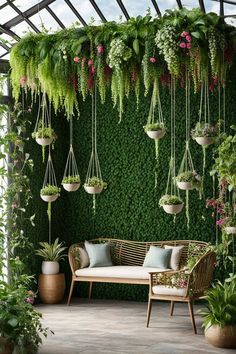 an outdoor seating area with hanging plants and potted plants