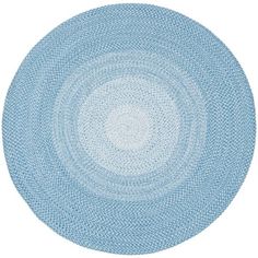 a blue rug with white circles in the center on a white background, top view