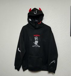 Lil Peep - Hellboy devil horn hoodie  Custom made by me with HTV on a poly-cotton blended fabric hoodie  Sizes S-XXL available. It does run a tad on the smaller side, so please keep this in mind when placing your order. I highly recommend sizing up 🙂*  Care instructions: Machine Wash Cold, Tumble Dry (inside out) on low setting  This product does typically take me a little longer to make, so please allow at least 10 business days from date of purchase for it to ship out🙏 Feel free to check out my page for more fun handmade GBC and Lil Peep products! Hooded Cartoon Print Sweatshirt For Streetwear, Hip Hop Halloween Hoodie With Graphic Print, Sporty Hooded Hoodie With Character Print, Black Fleece Halloween Hoodie, Black Fleece Hoodie For Halloween, Black Hooded Hoodie With Cartoon Print, Black Cartoon Print Hoodie, Casual Halloween Hoodie With Adjustable Hood, Black Hoodie With Cartoon Print For Streetwear