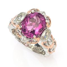 You'll look pretty in pink with this 5.01 carat Gems en Vogue ring on your finger. It beautifully displays an 11x9mm oval, 4.32 carat fuchsia pink fluorite center stone. Two 5x3mm oval and two 1.75mm round white zircon gems add even more dazzling sparkle. The eye-catching ring is crafted in a sterling silver and palladium alloy with 18K rose gold plated accents. A polished finish offers across-the-room gleam. It's the perfect finishing touch to any look, whether you're going casual or dressing u Luxury Pink Ruby Ring With Accent Stones, Pink Ruby Ring With Gemstone Accents For Anniversary, Pink Oval Ruby Ring With Gemstone Accents, Extravagant Dresses, Pink Fluorite, Raspberry Wine, Imvu Outfits, Imvu Outfits Ideas Cute, Dream Engagement