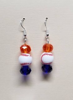 the baseball earrings are made with glass beads