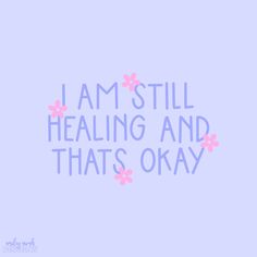 the words i am still healing and that's okay on a blue background