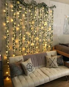 a living room filled with furniture and lots of lights