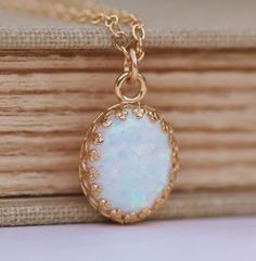 Genuine White Opal NecklaceGold Crown Edge by hangingbyathread1 White Opal Jewelry, Delicate Gold Opal Jewelry, Delicate White Opal Jewelry, White Opal Birthstone Jewelry, Dainty White Opal Jewelry, White Ethiopian Opal Jewelry For Anniversary, White Oval Opal Necklace, White Ethiopian Opal Gemstone Jewelry, White 14k Gold Oval Pendant Necklace