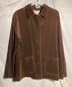 Vintage Jones New York Sport 5 Button Jacket Women's.   Brown   Large           Shell 100% cotton.           Lining 100% Polyester.  (On top 5" part of inside jacket). Light-weight Jacket for Summer / Spring / Fall.  Two Waist Pockets. Condition is New Old Stock with tags.  Shipped with USPS Mail/Fedex. Brown Casual Blazer With Snap Buttons, Casual Brown Blazer With Snap Buttons, Long Sleeve Corduroy Utility Jacket With Button Closure, Corduroy Utility Jacket With Button Closure, Corduroy Long Sleeve Utility Jacket With Button Closure, Casual Corduroy Outerwear With Buttons, Brown Corduroy Outerwear With Button Closure, Long Sleeve Corduroy Outerwear With Buttons, Long Sleeve Corduroy Outerwear With Button Closure