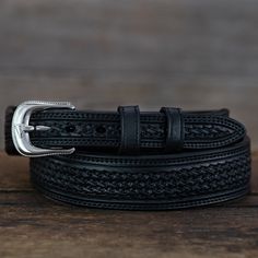 The Vogt Silversmiths selection of belts are fully hand tooled and made of American saddle leather. Our belts are lined in top grain leather for extra durability and are accented with fine stitching and hand rubbed edges. Available in 2 belt styles: 1-1/2" tapered to 1" 041-052 Need a 1" Buckle Set? See our full collection of genuine Vogt 1" sterling silver buckle sets. 1-1/2" Straight 041-055 Need an 1 1/2" Buckle Set? See our full collection of genuine Vogt 1 1/2" sterling silver buckle sets. Chocolate Basket, Black Basket, Belt Style, Woven Belt, Saddle Leather, Top Grain Leather, Hand Tools, Saddle, Basket Weaving