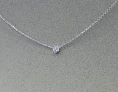 DIAMOND NECKLACE / 14k GOLD DIAMOND SOLITAIRE NECKLACE / FLOATING DIAMOND / WHITE GOLD DIAMOND NECKLACE / DIAMOND BEZEL NECKLACE / BRIDAL GIFT / BIRTHDAY GIFT/ DIAMOND SOLITAIRE NECKLACE / BRIDAL JEWELRY / DAINTY DIAMOND NECKLACE / STATIONARY DIAMOND BEZEL NECKLACE FEATURED PICTURE IS A DIAMOND NECKLACE 0.20 CT ( 3.8 MM). THIS NECKLACE IS AVAILABLE ALSO AT DIFFERENT SIZES. PLEASE CHOOSE FROM THE OPTIONS. THE MM GAUGES FOR EACH SIZE DIAMOND IS LISTED BELOW. 0.03CT= 2.1MM MINI DIAMOND 0.05CT = 2.5 Minimalist Diamond Necklace, Necklace Gold Diamond, Floating Diamond Necklace, Solitaire Diamond Pendant, Padlock Necklace, Dainty Diamond Necklace, Floating Necklace, Bezel Necklace, Solitaire Necklace