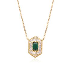 Elevate your style with our Gold-Plated over Sterling silver Art Deco Pendant. Meticulously crafted, this captivating pendant showcases an emerald-cut green spinel at its center, complemented by exquisite baguettes. The unique exagonal shape adds a touch of vintage elegance. With a 16-inch chain and 2-inch extension, this pendant offers a customizable fit. Embrace the vintage-inspired beauty of this Gold-Plated Art Deco Pendant, perfect for adding a touch of sophistication and glamour to any ens Elegant Green Baguette Cut Necklace, Elegant Octagon Green Necklace, Elegant Green Octagon Necklace, Elegant Green Baguette Cut Emerald Necklace, Elegant Green Baguette-cut Emerald Necklace, Green Baguette Diamond Jewelry For May Birthstone, Elegant Green Hexagonal Jewelry, Elegant Green Hexagon Shaped Jewelry, Art Deco Pendant