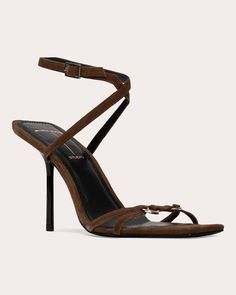 Brought to life in genuine suede, the Frankie sandal elevates its strappy upper with metal ring embellishments across the forefoot. The squared toe and slim stiletto heel reflect architectural inspiration. Buckle closure Metal ring details Squared toe Stiletto heel Upper: 100% kid suede Sock: 100% leather Lining: 100% satin Outsole: 100% leather Heel: 100% ABS Spot clean Handmade in Brazil Size & Fit Heel height: 3.93in (100mm) This item runs slightly small. If you are in-between sizes, we recom Brown Kid, Buckle Heels, Buckled Heels, Fashion Catalogue, Stiletto Pumps, Suede Sandals, Architectural Inspiration, Brown Sandals, Metal Ring