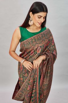 The elegance of this bottle green heavy Kani weave sari is sure to leave everyone awestruck! It comes with a matching blouse piece. Disclaimer: The shown stitched blouse on the model is for display purpose only. The saree comes with a matching blouse piece and finished with fall and piko. Tussar Silk Sarees, Indian Clothing Store, Latest Designer Sarees, Fashion Journals, Tussar Silk Saree, Indian Clothing, Traditional Fabric, Bottle Green, Designer Sarees