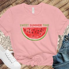 "Sweet summertime is a reason to celebrate! A cute watermelon print along with \"sweet summer time\" printed on the chest.  This classic unisex jersey short sleeve tee fits like a well-loved favorite. Soft cotton and quality print available in 4 colors!" Sweet Pink Summer Tops, Sweet Pink Summer Top, Sweet Cotton Summer Top, Trendy Tops For Spring And Summer Activities, Cotton Tops For Summer Activities, Sweet Fruit Print Summer Tops, Sweet Summer Tops With Fruit Print, Sweet Fruit Print Tops For Summer, Pink Fruit Print Tops For Summer