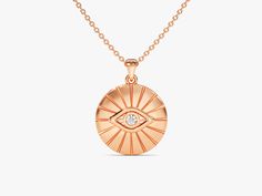 Ward off negativity and embrace style with our Evil Eye Coin Necklace in opulent 14k Solid Gold. Meticulously crafted, this captivating piece features a delicate gold chain and a unique coin pendant adorned with the protective symbol of the evil eye. FEATURES • Made to Order • Height: 11.50 mm • Width: 11.50 mm • Gold Kt: 14k Solid Gold, 18k Solid Gold • Available Gemstones: Diamond, Moissanite • Gemstone Cut: Round • Diamond Color - Clarity: G Color - SI1 Clarity • Number of Stones and Size: 1 Symbolic Yellow Gold Coin Necklace, Symbolic 14k Gold Coin Necklace, Round Evil Eye, Cushion Moissanite Engagement Ring, Delicate Gold Chain, The Evil Eye, Evil Eye Necklace, Protect Yourself, Coin Necklace