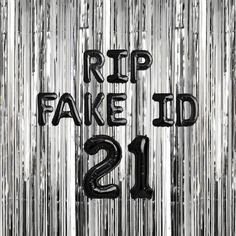 a black and white photo with the words rip fake it in front of silver tinsel