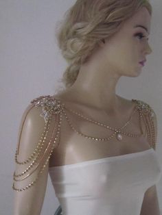 "Shoulder Necklace Bridal shoulder necklace Sizes: XS / Shoulder Measurement 13.5'' S / Shoulder Measurement 14.5\" M / Shoulder Measurement 15.5\" L /Shoulder Measurement 16.5\" Thank you so much for choosing my store. It is very importent to let my customers happy, so dont hesitate to contact me for your questions. Standart shipping I ship from Turkey , General delivery durations are USA : 12 /20 days Canada : 10/20days Australia: 15/25 days" Gold Embellished Wedding Jewelry, Gold Embellished Bridal Necklace For Party, Glamorous Crystal Body Chain For Wedding, Gold Rhinestone Body Jewelry For Wedding, Glamorous Beaded Backdrop Necklace For Weddings, Glamorous Gold Backdrop Necklace For Wedding, Elegant Wedding Body Chain With Rhinestones, Elegant Rhinestone Body Chain For Wedding, Elegant White Body Chain For Wedding