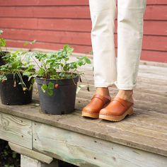 Classic Swedish clog style in cognac brown pull up leather. Made on our varnished Ideal wooden clog bottoms. - Cognac Brown Leather - Troentorp Clogs' Ideal bottoms - Anatomically constructed footbed with arch support - Alderwood footbed for ultimate moist absorption - Thick Ideal PU sole for increased comfort - Heel height: 5.5 cm - Width: Regular *TROENTORP SIZE GUIDE* Women's Clog Sizes: EUR 35 | USA 5 - 5 1/2 (232mm | 9 3/16 inches) EUR 36 | USA 6 - 6 1/2 (239mm | 9 7/16 inches)  EUR 37 | USA 7 - 7 1/2 (246mm | 9 11/16 inches) EUR 38 | USA 8 - 8 1/2 (252mm | 10 inches) EUR 39 | USA 9 - 9 1/2 (259mm | 10 4/16 inches) EUR 40 | USA 10 - 10 1/2 (266mm | 10 8/16 inches) EUR 41 | USA 11 - 11 1/2 (272mm | 10 12/16 inches) EUR 42 | USA 12 - 12 1/2 (280mm | 11 inches) Men's Clog Sizes: EUR 41 | Troentorp Clogs, Clogs For Women, Clog Style, Mens Clogs, Brown Clogs, Swedish Clogs, Clogs Style, Wooden Clogs, Comfortable Heels