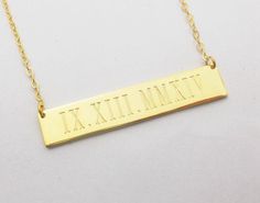 "The Sterling Silver Roman Numeral Bar Necklace 18K Gold Plated - A perfect gift for wedding holidays, anniversaries, birthdays,valentine, Christmas,mother's day and more. Wear the roman numberal engraved on a beautiful Gold Plated bar Necklace! Bar necklaces are a popular trend in the fashion world and you definitely do not want to be without one in your wardrobe! All of my products are handmade. Why buy from us? Quality Product At Affordable Prices 1.2mm Super Thickness. 100% Satisfaction Guar Rectangular Gold Necklaces For Wedding, Gold Rectangular Necklace For Wedding, Rectangular Gold Necklace For Wedding, Personalized Bar Necklace For Anniversary, Gold Nameplate Necklace For Wedding Gift, Elegant Customizable Bar Necklace For Gifts, Customizable Gold Bar Necklace For Anniversary, Silver Bar Necklace For Anniversary, Personalized Rectangular Jewelry For Wedding Gift