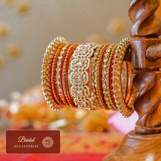 Exuding radiance on your special occasions has never been easier! A graceful and beautiful set of bangles handcrafted with champagne stones and pearl moti to accompany you through wedding celebrations. One order includes two bangle sets. Available in various sizes. Gold-plated on high-quality brass as base metal. Pariza Bangles Size 2.6 are in-stock & ready-to-ship. The delivery time frame for other sizes is 4-6 weeks. For custom or urgent requests, please contact support@alacouture.com. *Please Temple Jewelry Style Jeweled Bangle For Wedding, Temple Style Jeweled Bangle For Weddings, Jeweled Bracelets For Wedding And Diwali, Fusion Style Bangle For Wedding And Diwali, Fusion Style Bracelet For Wedding And Diwali, Fusion Style Wedding Bracelet For Diwali, Fusion Style Festive Bridal Sets Hand Set, Festive Fusion Style Hand Set Bridal Sets, Fusion Kundan Bangle For Wedding