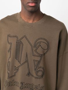 embroidered-logo cotton sweatshirt from PALM ANGELS featuring earth brown, cotton, embroidered logo to the front, monogram print, crew neck, long sleeves and straight hem. This item is in size L and the color is Long Sleeve T-shirt With Logo For Streetwear, Oversized Long Sleeve Tops With Embroidered Logo, Oversized Streetwear Sweater With Embroidered Logo, Oversized Sweater With Embroidered Logo For Streetwear, Oversized Sweater With Embroidered Logo, Brown Sweatshirt With Embroidered Logo For Fall, Brown Long Sleeve Sweatshirt With Embroidered Logo, Brown Fall Sweatshirt With Embroidered Logo, Brown Cotton Sweatshirt With Embroidered Logo