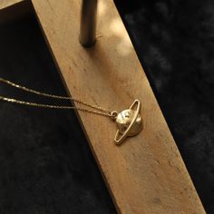 Real 14K Solid Gold Saturn Charm Planet And Star Stylish Best Friend  Necklace For Women And Girls Pendant Valentine's Day Gift ,Custom Design Monsini  ❤❤【Materials & Specifications:】 - 14K gold pendant and chain - Chain thickness is 0.9mm - Hamsa pendant dimensions are Width:1.9cm (0,74in) Length:1.00cm (0.39in) ❤❤【Available in 4 different chain lengths】 42 cm (16.5 in) 44 cm (17.3 in) 46 cm (18.1 in) 48 cm (18.8 in) Gold Color: Rose Gold, Yellow Gold, White Gold ❤【The Gift of Love】 - Remind he Gold Plated Hallmarked Charm Necklaces, Celestial Style Necklace With Polished Finish As Gift, Celestial Engraved 14k Gold Necklace, Gold Celestial Necklace With Polished Finish, Hallmarked Gold Plated Charm Necklaces, Engraved Celestial 14k Gold Necklace, Polished Yellow Gold Charm Necklaces, Celestial Style Yellow Gold Tarnish Resistant Jewelry, Celestial Style Yellow Gold Tarnish-resistant Jewelry