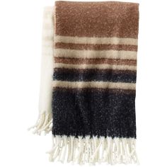 a brown and black striped blanket on a white background