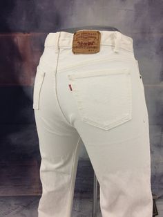 Size 34 Levi's 501 Button Fly White Jeans Vintage 80's Distressed Cropped Ankle Jeans Made In USA, Waist 34"W Brand: LEVIS 501 Size On Tag marked 36X32 but fits more like 34" waist, 13" rise, 46" hips, 25" inseam,! Fits a size 34, but check your measurements and compares the measurement with your garment. (see full measurement below) Recommended size: 34" (34x25) Material :  Cotton 100% Made In USA NOT YOUR SIZE? LOOK OTHER LISTING ✂-- www.etsy.com/shop/AberyApparelClothing Vintage 80's White Je Levis 501 Women, Womens Distressed Jeans, White Levis, High Waisted Distressed Jeans, Levis Vintage, Jean Vintage, Distressed Boyfriend Jeans, Tall Jeans, Jeans Mom