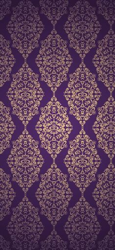 a purple and gold wallpaper with an intricate design