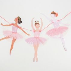 three ballerinas in pink tutus holding hands