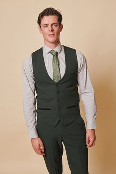 As worn by Leicester City midfielder Harry Winks! This stately three-piece suit for discerning gentlemen is a distinguished selection for formal occasions, like nuptials. Its timeless Prince of Wales check motif exudes elegance, while the elastane blend ensures ease of movement and comfort. The olive green hue accentuates any refined look. Model wears size 38R blazer, 38R waistcoat & 30R trousers. Features Slim fit Single-breasted waistcoat Prince of Wales check Notch lapel Single back vent Four Harry Winks, Olive Green Fabric, Deep Olive Green, Prince Of Wales Check, Check Suit, Checked Trousers, Checked Blazer, Color Complement, Leicester City