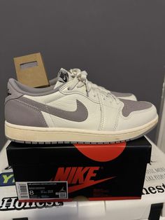 Elevate your sneaker game with this stylish and iconic Air Jordan 1 Retro OG Low Sail Atmosphere Grey. With a low top shoe shaft style and a classic white colorway, these sneakers are perfect for any casual or athletic occasion. The shoe features a sail/black/atmosphere grey colorway and a style code of DZ0790-101. Crafted with the highest quality materials, these sneakers are designed to provide maximum comfort and support. The Air Jordan 1 Retro OG Low Sail Atmosphere Grey is a must-have addition to any sneaker collection and is sure to turn heads. Don't miss out on the opportunity to own a piece of sneaker history. Sneaker Games, Air Jordan 1 Retro, Jordan 1 Retro, Sneaker Collection, Air Jordan 1, Top Shoes, Classic White, Jordan 1, Low Top