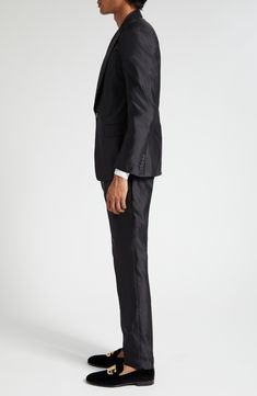 The brand's slim Sicilia fit shows off the silk-shantung construction to its fullest richness of texture and sheen on this Italian-tailored two-piece suit. Jacket has peaked lapels; four-button cuffs; chest welt pocket; front flap pockets; two interior pockets; back vent Pants have zip fly with hook-and-bar closure; front slant pockets; coin welt pocket; back button-welt pockets Jacket is lined; trousers are lined to the knee 100% silk Dry clean Made in Italy Men's Designer Clothing Classic Satin Suits For Semi-formal Occasions, Elegant Satin Suits With Notch Lapel, Classic Tailored Satin Suits, Tailored Satin Elegant Suit, Elegant Satin Suits With Suit Collar, Designer Fitted Sets With Suit Collar, Classic Satin Business Suit, Classic Fitted Satin Suit, Tailored Satin Suits For Formal Occasions