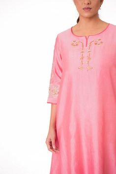 Lotus pink A-line kurta with embroidery along the neckline and sleeves. Paired with a pant and tissue applique work dupatta. - Aza Fashions Festive Fitted Traditional Wear With Embroidery, Fitted Kurta With Embroidered Neckline For Festive Occasions, Festive Pink Kurta With Embroidered Neckline, Festive Fitted Kurta With Embroidered Neckline, Fitted Sets With Embroidered Neckline For Eid, Spring Chanderi Kurta With Embroidery, Fitted Straight Kurta Set With Embroidered Neckline, Fitted Straight Kurta With Embroidered Neckline, Eid Festival Fitted Set With Embroidered Neckline