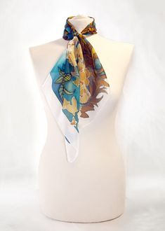 Square scarf Peacock Feather is hand painted with art nouveau pattern of flowers and peacock feathers, in vivid blue & gold color composition. Size: 22 by 22 in (55 by 55 cm) 34 by 34 in (88 by 88 cm) Silk: natural Habotai Light (semi - transparent, very delicate and light, a bit glossy) This silk scarf is made to order and I will need 3 days for painting. The Peacock Feather scarf was designed by me as an Art Nouveau woman accessory! Please note that I don't track my designs, so the scarf f Art Nouveau Woman, Painted Silk Scarves, Feather Scarf, Art Nouveau Pattern, Silk Scarf Painting, Hand Painted Silk Scarf, Scarf Silk, Painted Silk, Hand Painted Silk